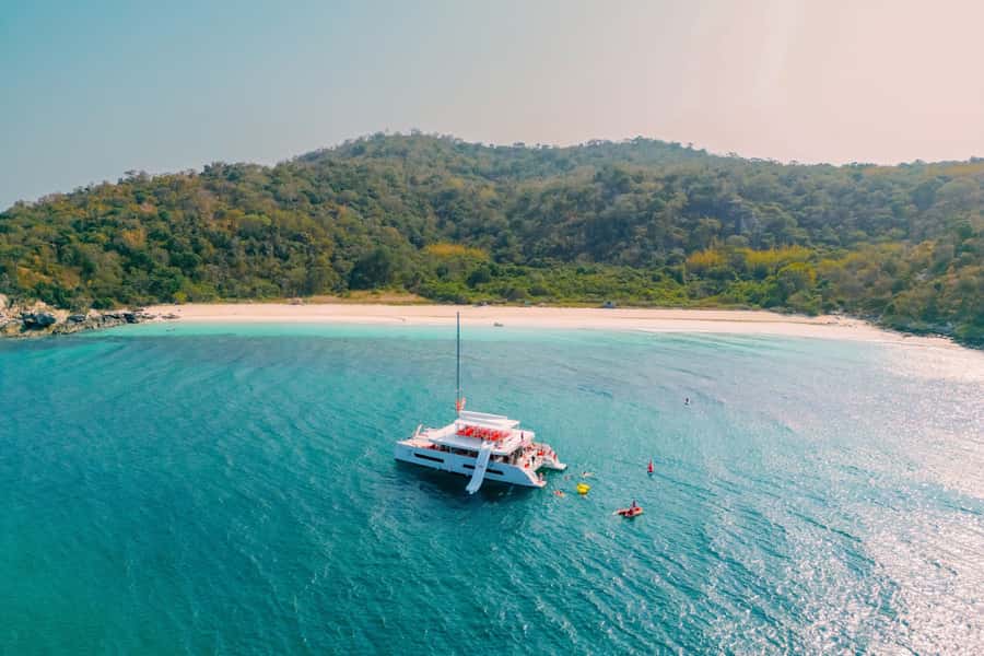 Pattaya: 3-Island Hopping Sunset Yacht & Buffet with Live DJ - Boarding an 82-foot yacht with room to move