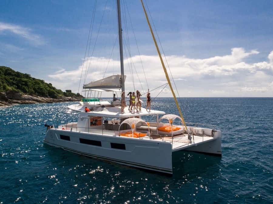 Phuket: Coral and Racha Island Yacht Tour with Lunch - Lunch on the yacht breaks up the island schedule