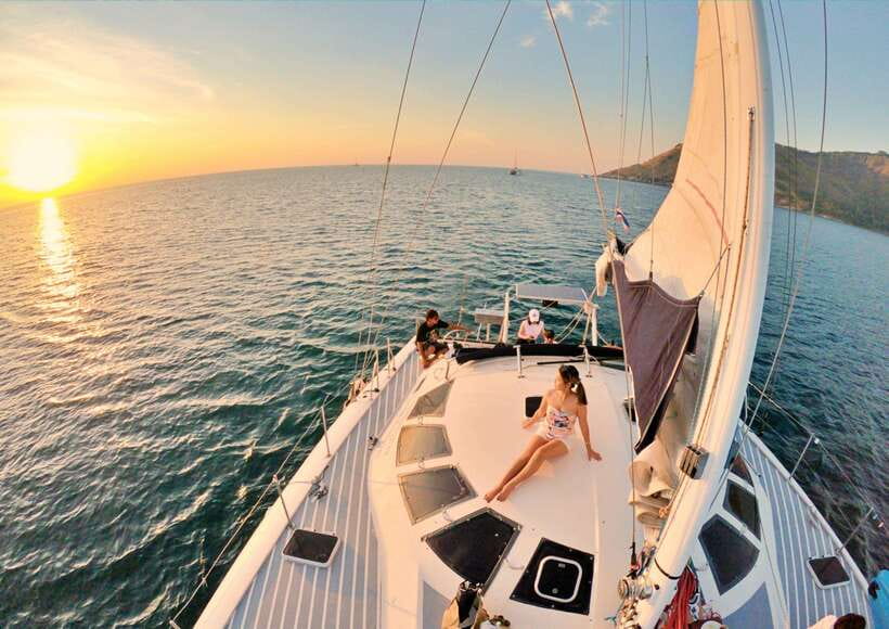 Phuket: Coral Island Catamaran Cruise with Sunset Dinner - Leaving Phuket by catamaran