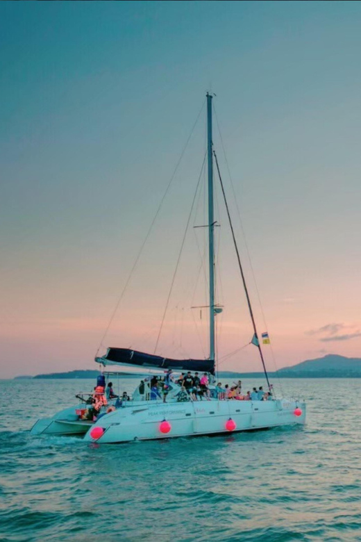 Phuket: Coral Island Catamaran Cruise with Sunset Dinner - The crew and the feel onboard