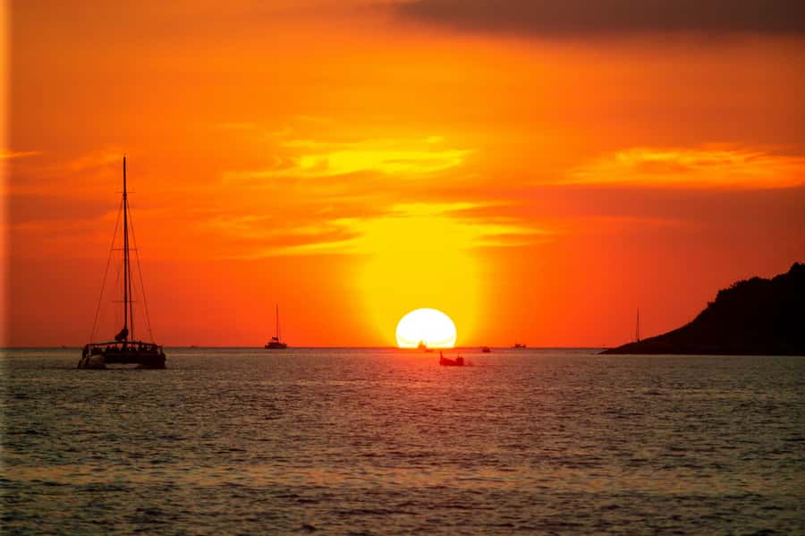 Phuket: Coral Island Day Trip and Sunset Dinner by Catamaran - Snorkeling from the beach and boat