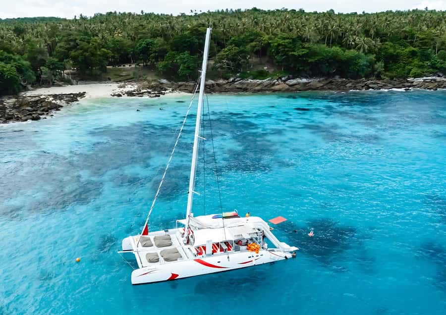 Phuket: Coral, Racha, Promthep Island Catamaran Trip & Lunch - Racha Island: the day’s strongest beach stop