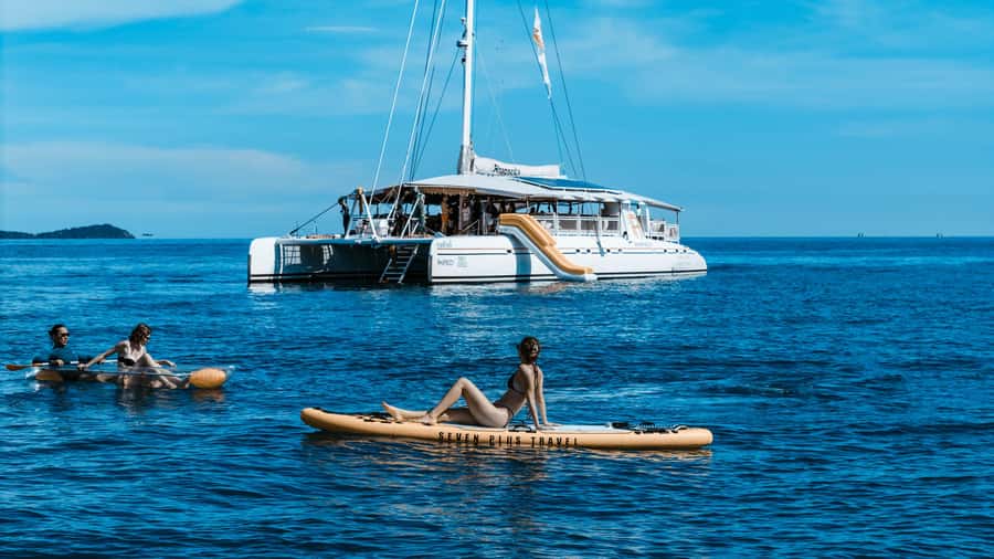Phuket: Coral & Racha Sunset Luxury Catamaran Party Cruise - Crew, languages, and the group atmosphere