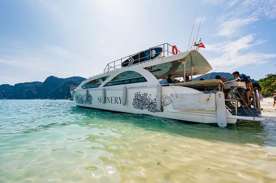 Phuket: Phi Phi Islands Day-Trip by Speed Catamaran - Pileh Lagoon by traditional longtail boat