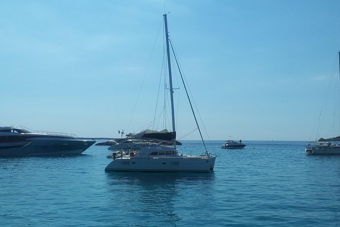 Playa de Ses Illetes Full Day Catamaran Trip - The boat, music, and space for 11