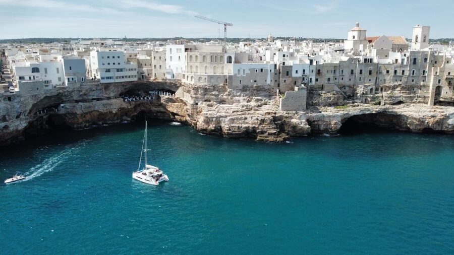 Polignano a Mare: Catamaran Tour with Aperitif & Local Food - Cala Corvino: swimming, paddleboards, and aperitivo