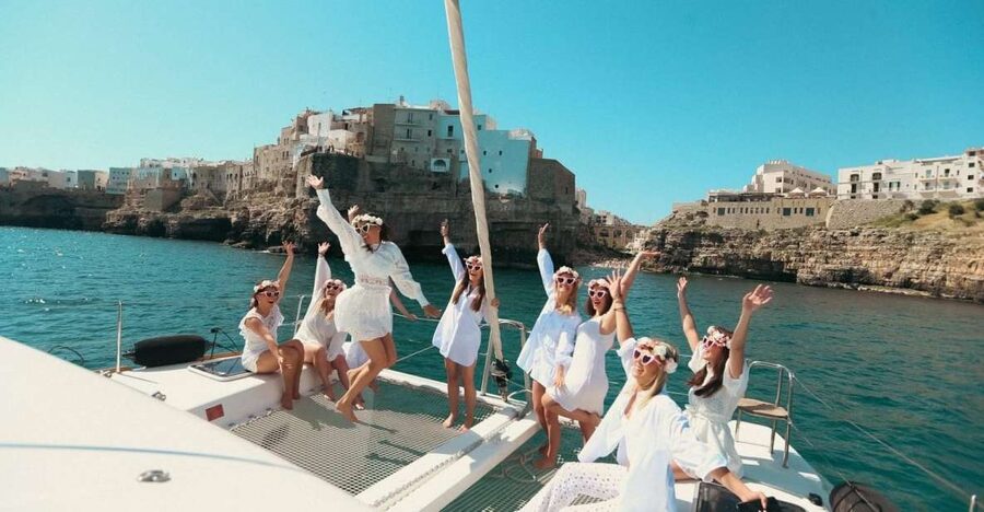 Polignano: Catamaran Cruise with Aperitif and Food - Grotta Palazzese from the Adriatic