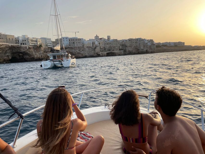 Polignano: Catamaran Cruise with Aperitif and Food - Leaving the marina and heading along the cliffs