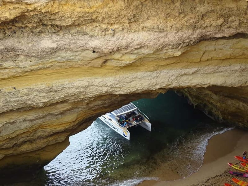 Portimão: Benagil Caves & Golden Coast Eco Catamaran Tour - Leaving Portimão Marina and finding Pier M