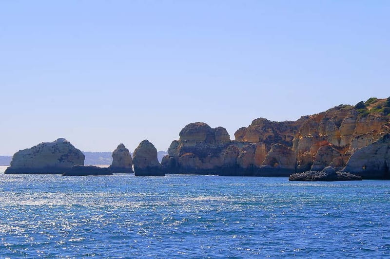 Portimão: Boat Trip by Sailing Boat to Lagos Cape Caves - The plank and a swim in the Atlantic