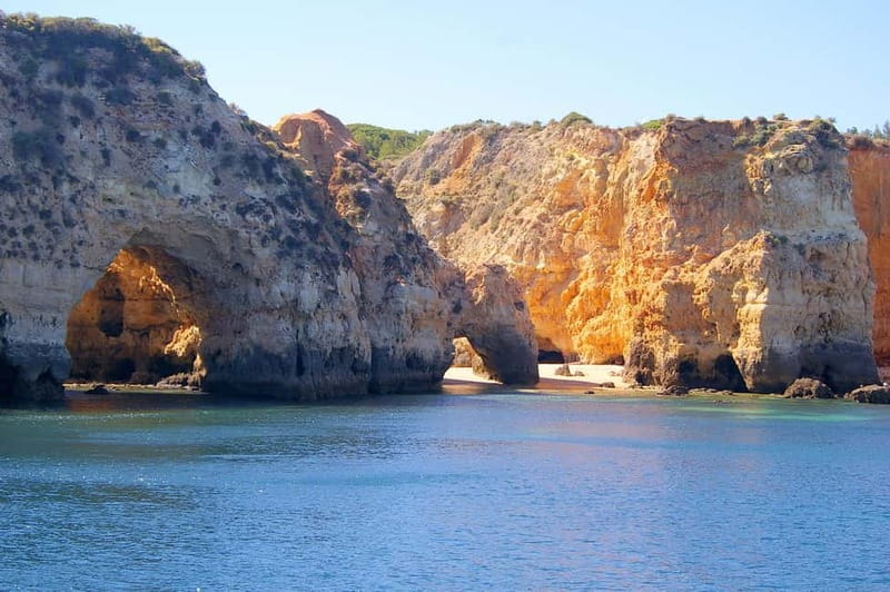 Portimão: Boat Trip by Sailing Boat to Lagos Cape Caves - Praia da Rocha and the first coastal views