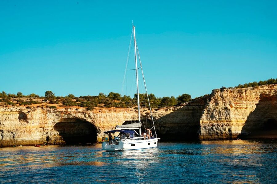 Portimao: Half-Day Sailing Yacht Cruise to the Benagil Caves - Swimming stops and paddleboard time