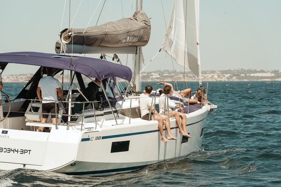 Portimao: Half-Day Sailing Yacht Cruise to the Benagil Caves - Dolphins, cliffs, and the slow pace