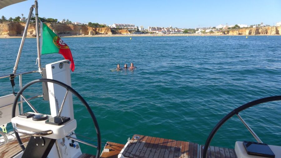 Portimão: Private Sailing Boat Tour with Swim and Wine - Passing Praia da Rocha toward João de Arens