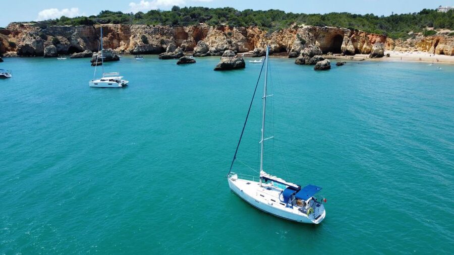 Portimão: Private Sailing Boat Tour with Swim and Wine - Sailing back by João de Arens