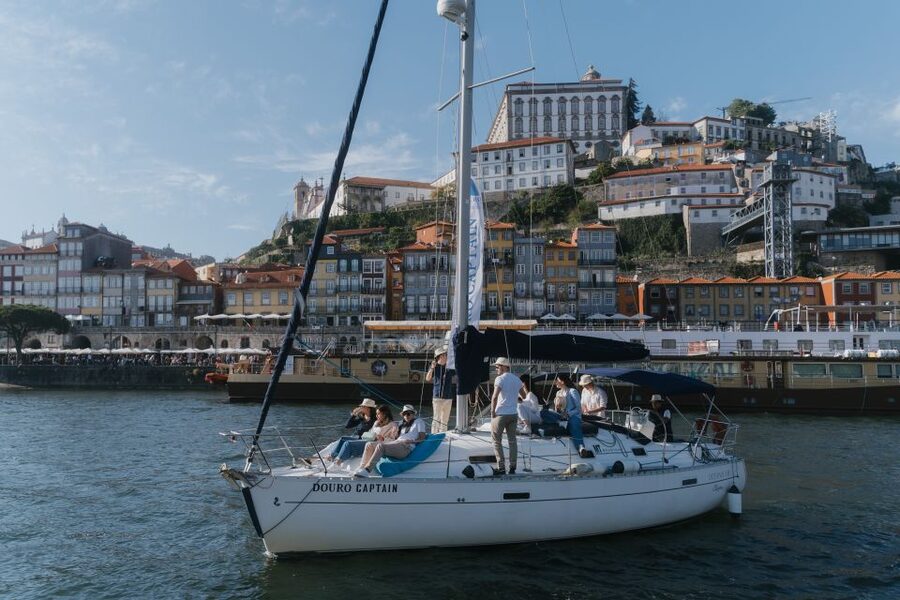 Porto: Charming Sailboat Cruise with Port Wine,Sunset Option - Under the Arrábida Bridge and past Gaia