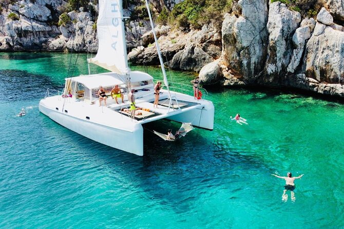Porto Conte: Half-day catamaran tour with aperitif - Setting out from Marina di Porto Conte