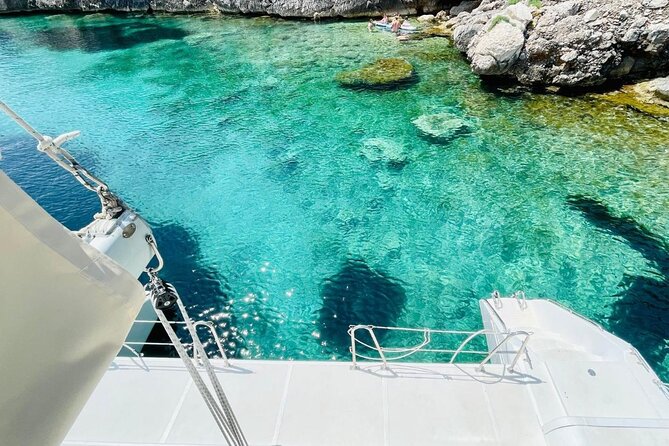Porto Conte: Half-day catamaran tour with aperitif - A Sardinian aperitif, not a full lunch