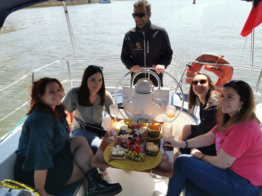 Porto: Private Sailboat Trip with Wine Tasting & Charcuterie - The tasting board near Ponte Dom Luís I