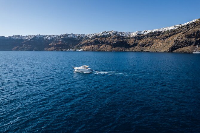 Private all included yacht Tour in Santorini - Fira, Firostefani, Imerovigli, and the Old Port from the sea