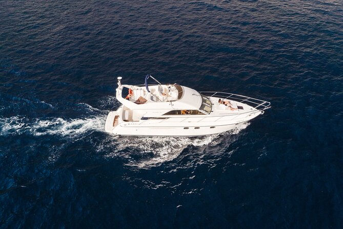 Private Boat Tour on Royal Ocean Yacht, Tenerife - Booking, pickup, and weather details