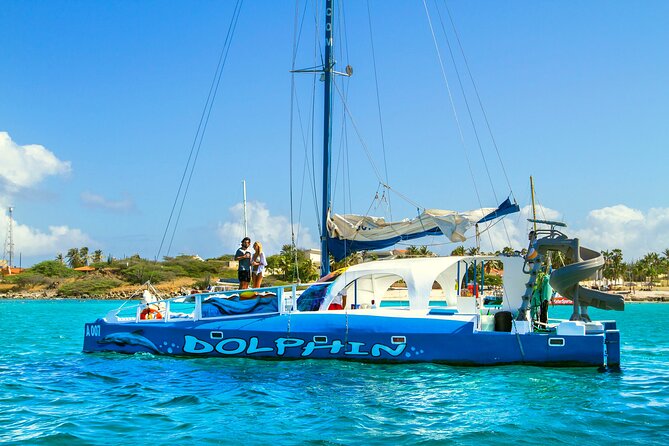Private Catamaran Adventure Cruise with Rope Swing and Water Slide - Caribbean music and cocktails keep the boat time lively