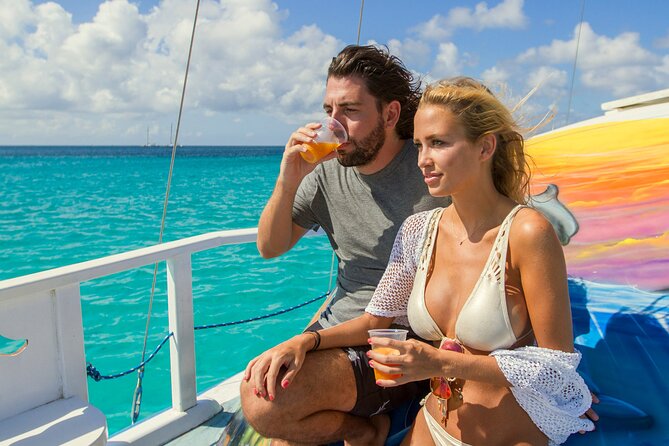 Private Catamaran Adventure Cruise with Rope Swing and Water Slide - The rope swing and water slide change the pace