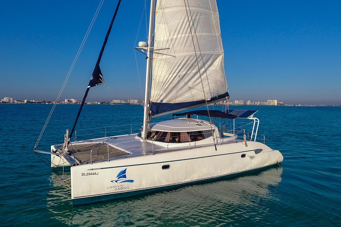 Private Catamaran from Cancun to Isla Mujeres | For up to 30 pepl - Open bar, crew service, and the food question