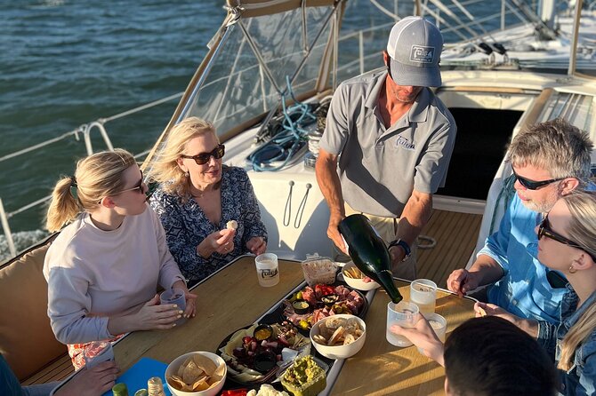 Private Morning Sail, Dolphin and History Tour on Mystique - The Yorktown and the broader harbor view