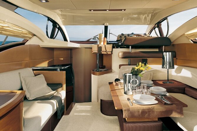 Private Motor Yacht Cruise with BBQ, Open Bar & Transfers - Indian Rocks, caves, and the Venetian Lighthouse