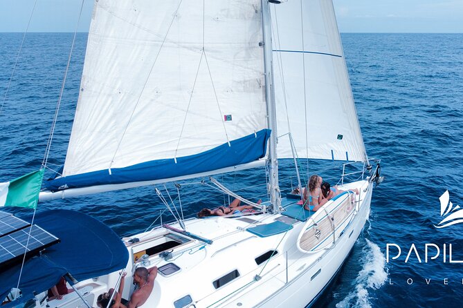 Private Sailboat tour in Cabo San Lucas with Papillon Yachts - Médano Beach, Snacks, and a Floating Lunch Break