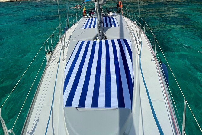Private sailing with Paella and Tapas in Palma - Swimming, snorkeling, and paddleboarding near a cove
