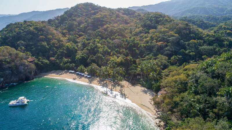 Puerto Vallarta: Luxury Yacht Tour with Lunch and Open Bar - Majahuitas Cove and its rainforest setting