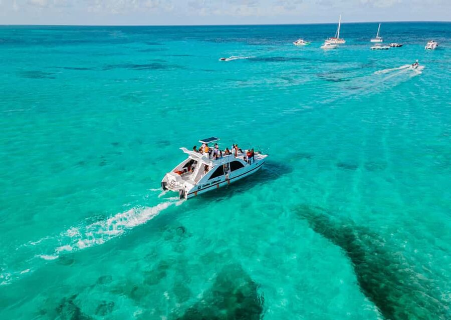 Punta Cana: Catamaran Tour with Reef Snorkeling and Open Bar - Swimming at the Bavaro natural pool