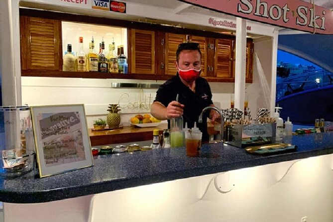 Restless Native Catamaran Sunset & Swizzle Cruise - Rum Swizzles, Juice, and Fresh Cookies