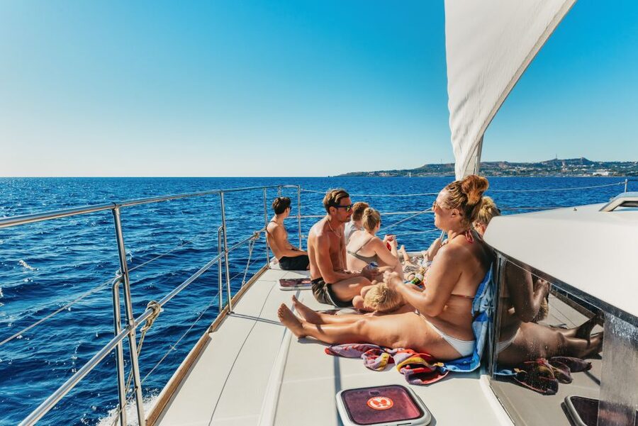 Rhodes: All-Inclusive Catamaran Cruise with Lunch and Drinks - Lunch on deck, with drinks from noon