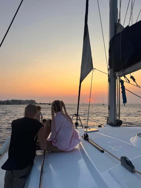 Rhodes: Sunset Catamaran Cruise with Snack, Fruits & Drinks - Fruit, cold drinks, and a relaxed deck