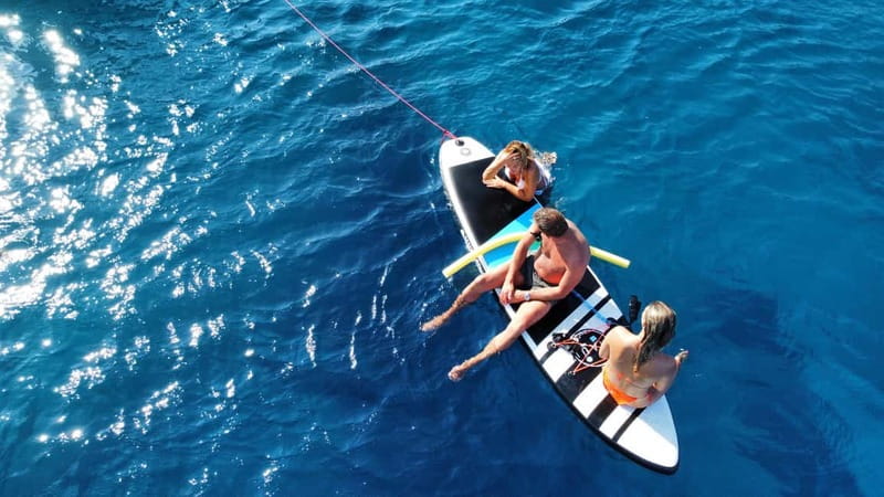 Rhodes: Sunset Catamaran Cruise with Snack, Fruits & Drinks - The return route and Rhodes sunset