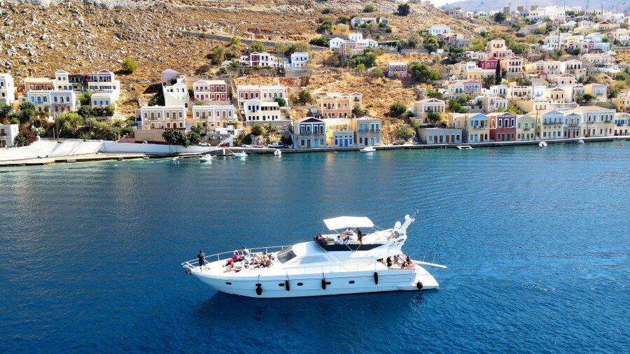 Rhodes: Symi Yacht Tour with Unlimited Drinks and Transfer - A small yacht makes the Rhodes to Symi crossing better