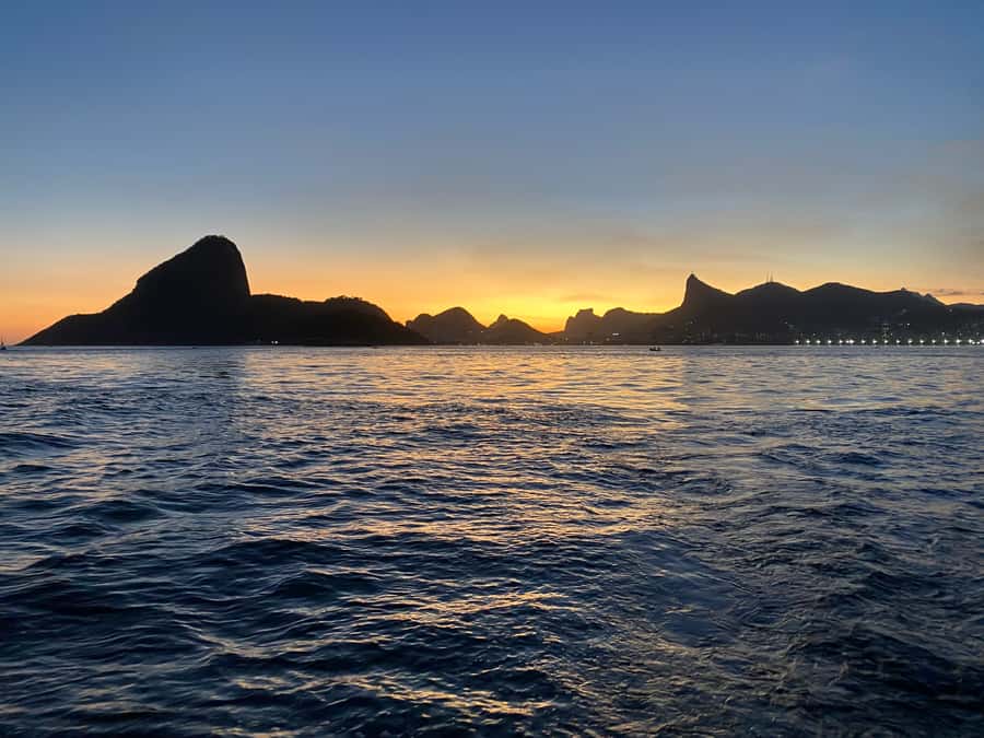 Rio de Janeiro: Sunset Sailboat Tour with Open Bar - Swimming, sun, and the best time to bring a towel
