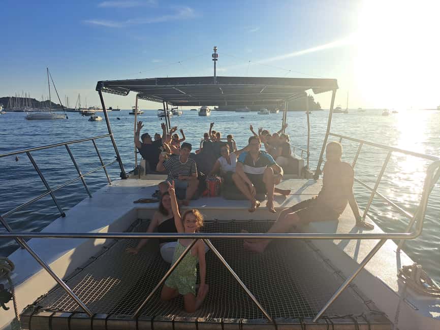 Rovinj: Sunset & dolphin group tours with Catamaran - Sunset over Rovinj and the final harbour view
