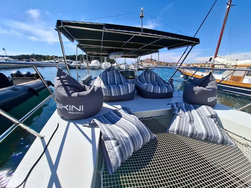 Rovinj: Sunset & dolphin group tours with Catamaran - Timing, weather, and cancellation details