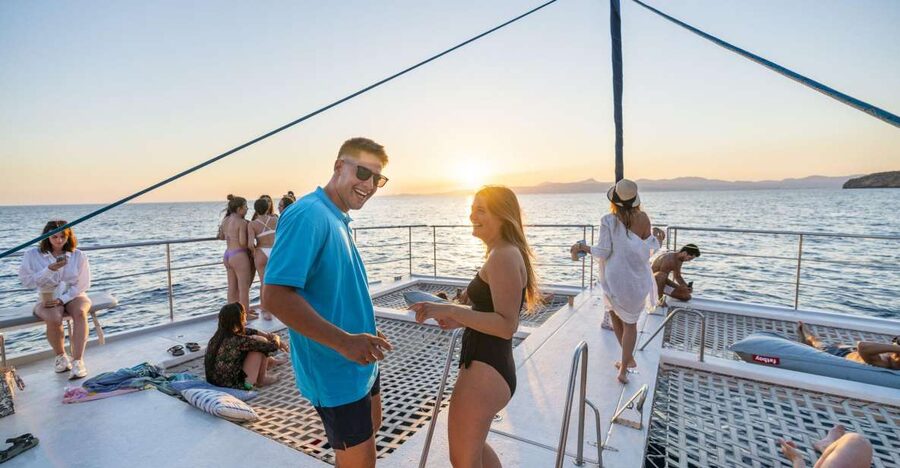 S'Arenal: Sunset Catamaran Cruise with BBQ - Leaving Playa del Arenal as the evening begins