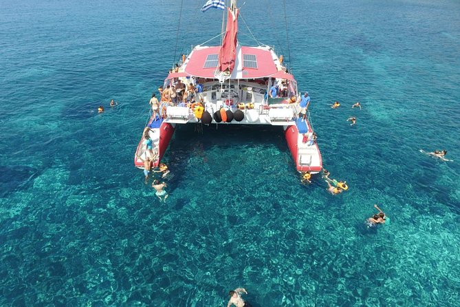 Sailing Catamaran Cruise in Santorini with BBQ, Drinks and Transfer - White Beach, BBQ, and the longest stop