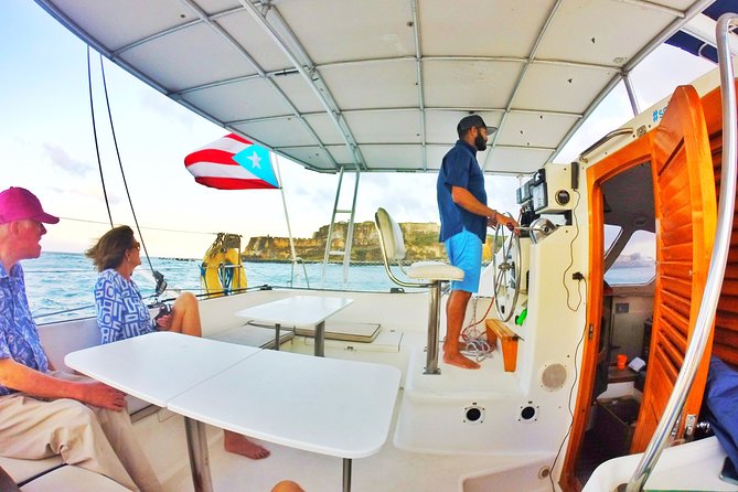 San Juan Catamaran Sunset Sail with Drinks Included - Drinks, food, and the onboard mood