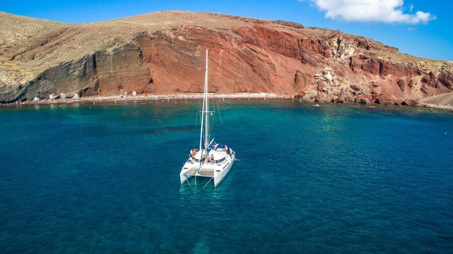 Santorini: 7-Hour Private Catamaran Cruise with Food & Drink - Lunch, snorkeling, and water time near Oia