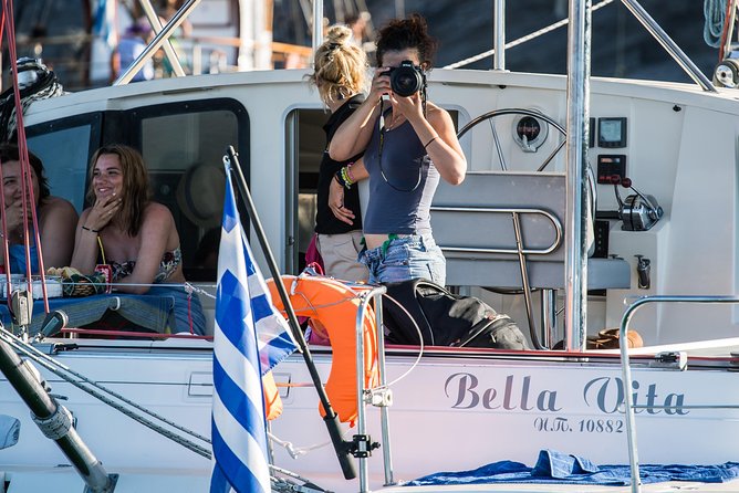 Santorini: Adventurous Catamaran Experience with Snorkeling - Red Beach and the volcanic coast