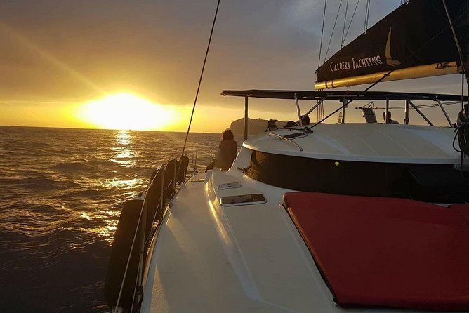 Santorini: Adventurous Catamaran Experience with Snorkeling - Swimming in the hot springs