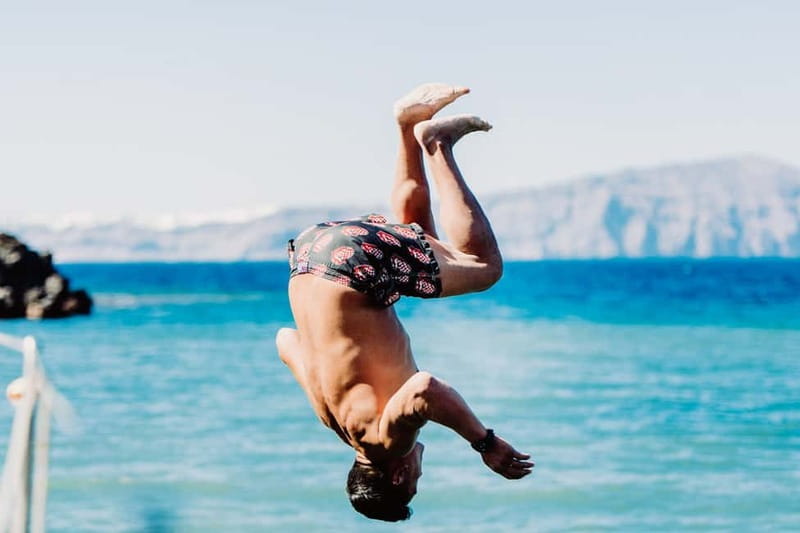 Santorini: Adventurous Catamaran Experience with Snorkeling - Lunch, wine, and the social side of the boat