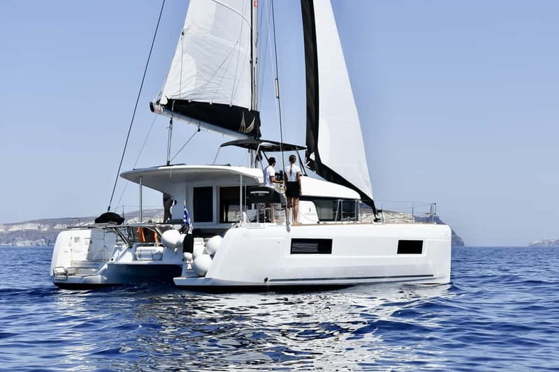 Santorini: All-Inclusive Private Catamaran Experience - Leaving Thera for Vlychada Marina